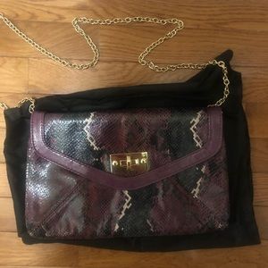 2 for $15! Purple snake print clutch